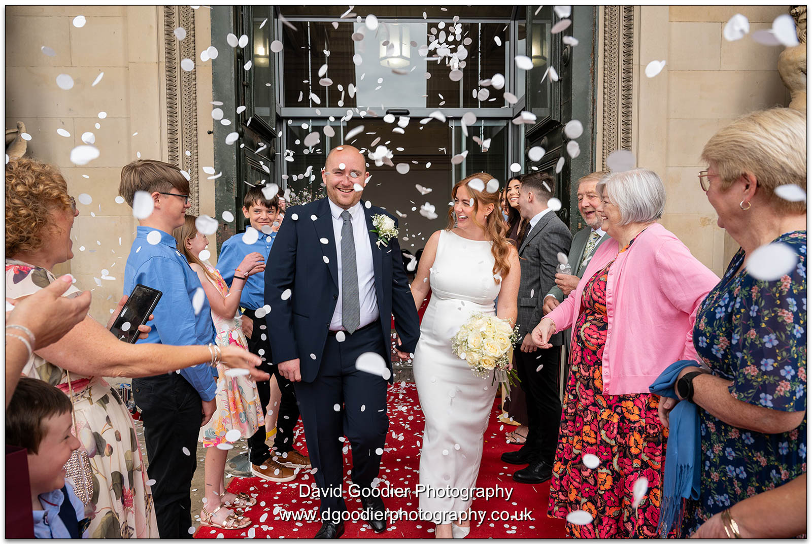 Bride and Groom at St' George's Hall Wedding with confetti